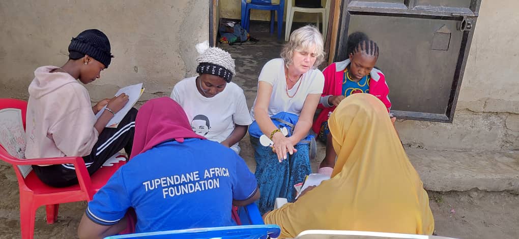 Volunteer reading with a child