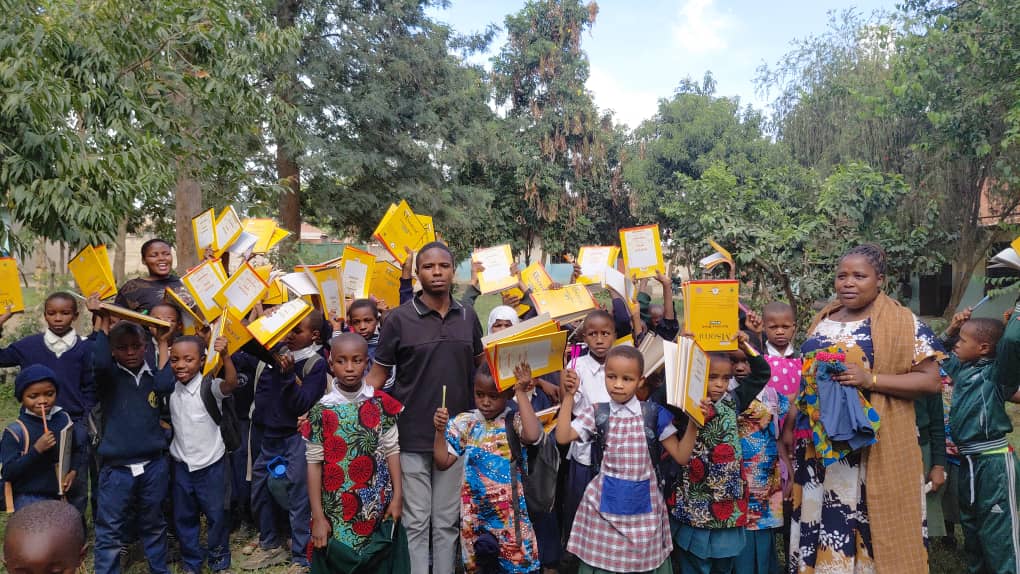 Children and caregivers outdoors during a community event